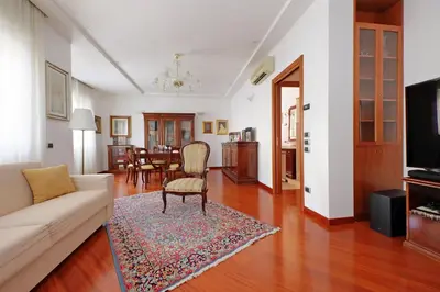 a living room with a couch and a table at FleminHouse a soli 10 min da San Pietro in Rome