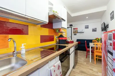 a kitchen with a sink and a counter top at La Casa di Marilù Vicino a Trastevere in Rome