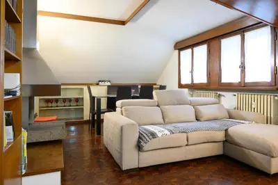 a living room with a couch and a table at Casa Justa Anastasio in Rome