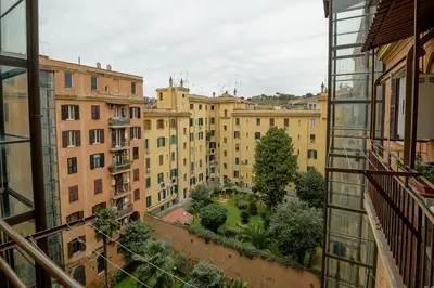 a view of a city from a building at Candia Cento Apartment Vatican Museums in Rome
