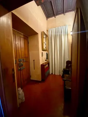 a room with a hallway with a door and a room with at 78 Luxury Margutta Suite in Rome