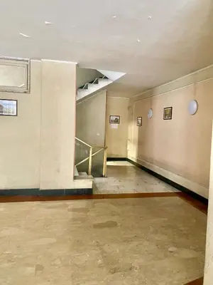 an empty room with a staircase in a building at ARCA LUXURY HOME in Rome
