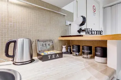 a kitchen counter with pots and pans on it at Aventino Industrial Loft in Rome