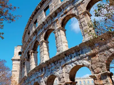 ancient ruins of a building with arches at Apartment Vatican - Residenza Argilla by Interhome in Rome