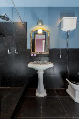 a bathroom with a sink and a mirror at Daniele Manin Roma in Rome