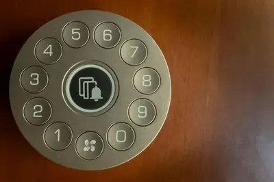 a close up of a remote control on a wall at Colosseo Romantic Suite in Rome
