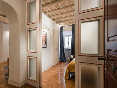 a hallway with a door and a room at The Best Rent - Spacious two-bedroom apartment in old town in Rome