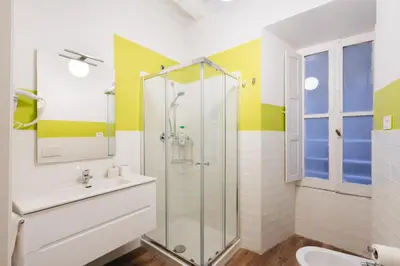 a bathroom with a shower and a sink at Famo Pace apartments in Rome