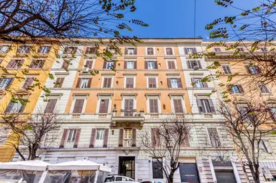 a large building with a lot of windows at Elena's house in Rome