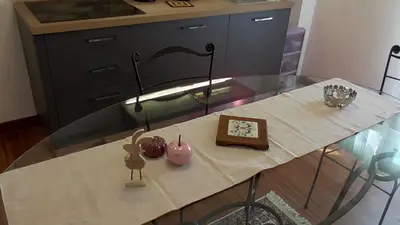 a glass table with some items on top of it at Italian romance - A fine apartment in Rome in Rome