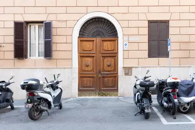 an open door to a hallway in a building at Cozy Suite Saint John in Rome