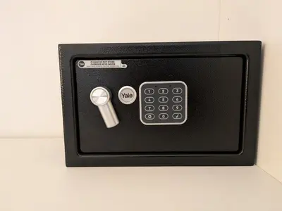 a small black box with a remote control at Il Nido di San Pietro - Cozy 2BR - Near Vatican in Rome