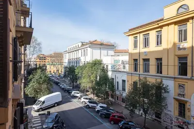 a view of a city street with parked cars at WMR Apartment near Vatican in Rome