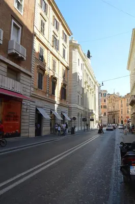 an empty street in a city with buildings at Leoncino 36 Apartments in Rome in Rome
