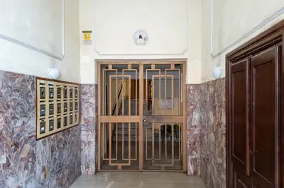 a door in a room with a wall at Italy House in Rome