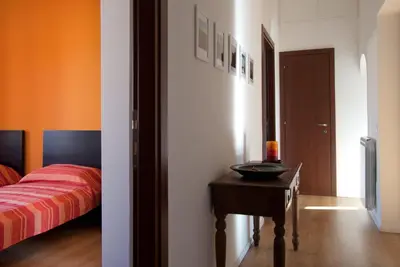 a bedroom with a bed and a table with a bowl on it at Welcome Friends in Rome