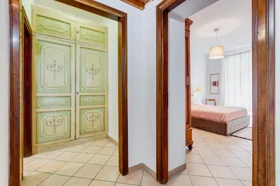 a room with a bedroom with a bed and a door at Apartment Atelier Testaccio in Rome