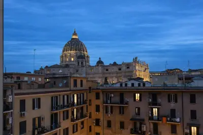 a view of a building with a domed cathedral at Central Rome 2BR Walk to Vatican & Piazza Navona in Rome