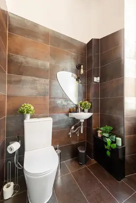 a bathroom with a toilet and a sink at Piacentino Homes San Giovanni apartment in Rome