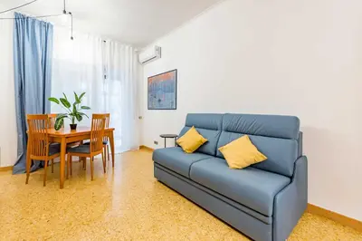 a hallway with a door and a room with a desk at Iolanda Fine & Spacious Flat in Rome