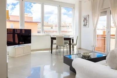 a living room with a couch and a table at Roma per te in Rome