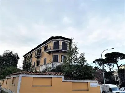 a building on the side of a street at Under Trastevere stars in Rome