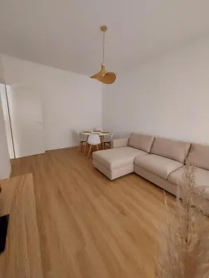 a living room with a couch and a table at Interno 4 al Vaticano in Rome