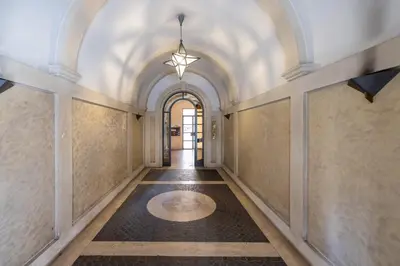 an empty hallway with an archway and a ceiling at DOMUS GIULIA in Rome