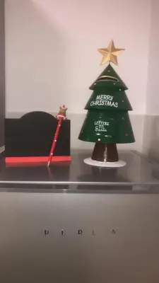 a christmas tree and a red sword on a table at AThome104 in Rome