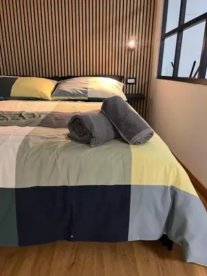 a bedroom with a bed with towels on it at AThome104 in Rome