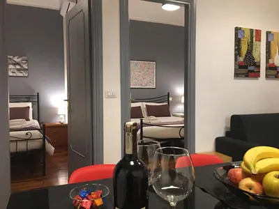 a bottle of wine sitting on a table in a room at Residenza San Martino in Rome