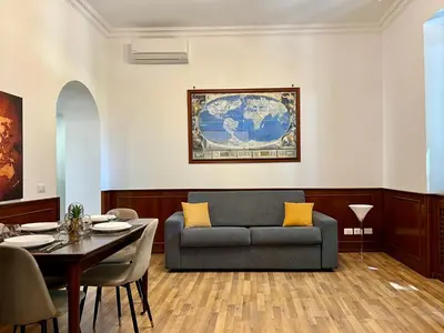 a living room with a couch and a table at Maison Vaticano in Rome
