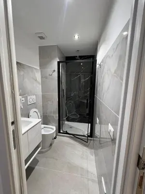 a bathroom with a shower and a toilet at Vatican Eagle in Rome