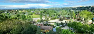 an overhead view of a city with trees and a street at Exclusive 230m2 Apt with Terrace and Panoramic Balcony in Rome
