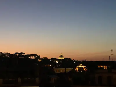 a view of the capitol building at sunset at Stylish Penthouse with terrace in Trastevere in Rome