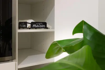 a book shelf with a box of marshmallow at Cozy Vatican in Rome