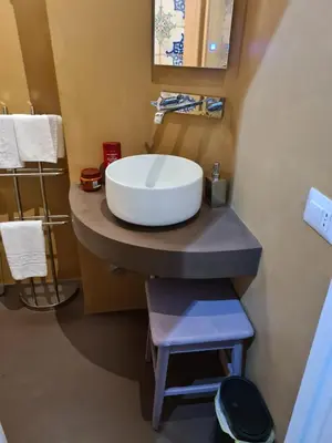 a bathroom with a large white sink on a counter at Al campanile Trastevere apartment in Rome