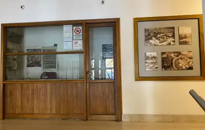 a restaurant entrance with glass doors and a picture at Casa Fontana - zona San Giovanni Colosseo in Rome
