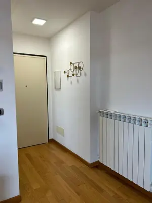 an empty room with a hallway with a door at Del Vecchio Apartment in Rome