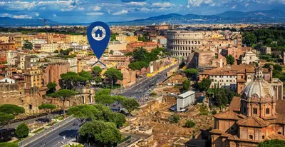 an aerial view of a city with a blue marker at Colosseum Charming Loft - Santa Maria in Carinis in Rome