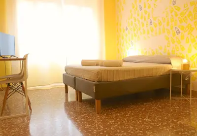 a bed in a room with a large window at Rome Sleep Home Bed & Breakfast in Rome