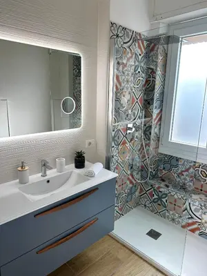 a bathroom with a sink and a shower at Casa Daniela in Rome