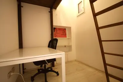 an office with a desk and a chair at Testaccio View Holiday House in Rome