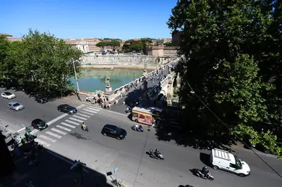 an aerial view of a street with cars and motorcycles at Casa Salimei in Rome