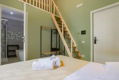 a bedroom with a bed with towels on it at Aquas Salvias in Rome