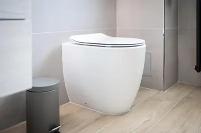 a bathroom with a white toilet in a room at Marconi white flower house in Rome