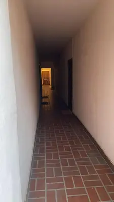 an empty hallway with a tile floor in a room at Domus Filiberto by Local Domus in Rome