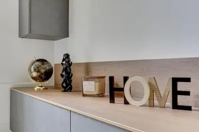 a shelf with a sign that says love on it at San Giovanni Cozy Apt - Home and More in Rome