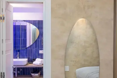 a bathroom with two surfboards on the wall at Flowery Rainbow in Rome