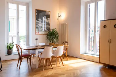 a dining room with a table and chairs at Boho 202 in Rome